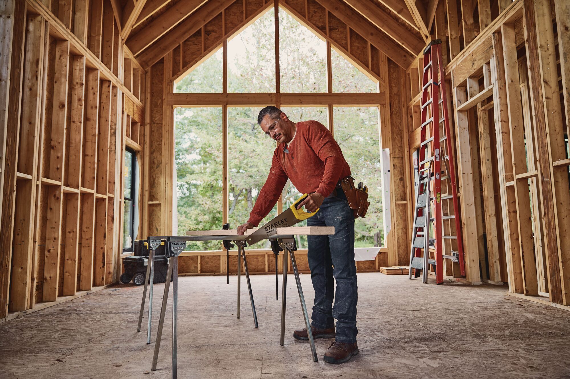 15 inch TRADE CUT Panel Saw being used for cutting wood by person.